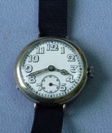 Wire lug porcelain dial transitional watch c1915
